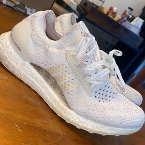 All white Adidas Ultra Boost